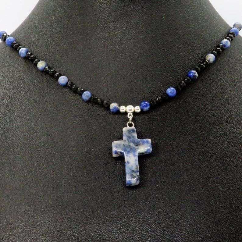 Blue Sodalite Cross with Black Spinel and Sodalite Beaded Necklace - perfect for Christian Jewelry lovers. Handcrafted by RivendellRocksSedona. #ChristianJewelry #BeadedNecklace  buff.ly/3SLKU3a