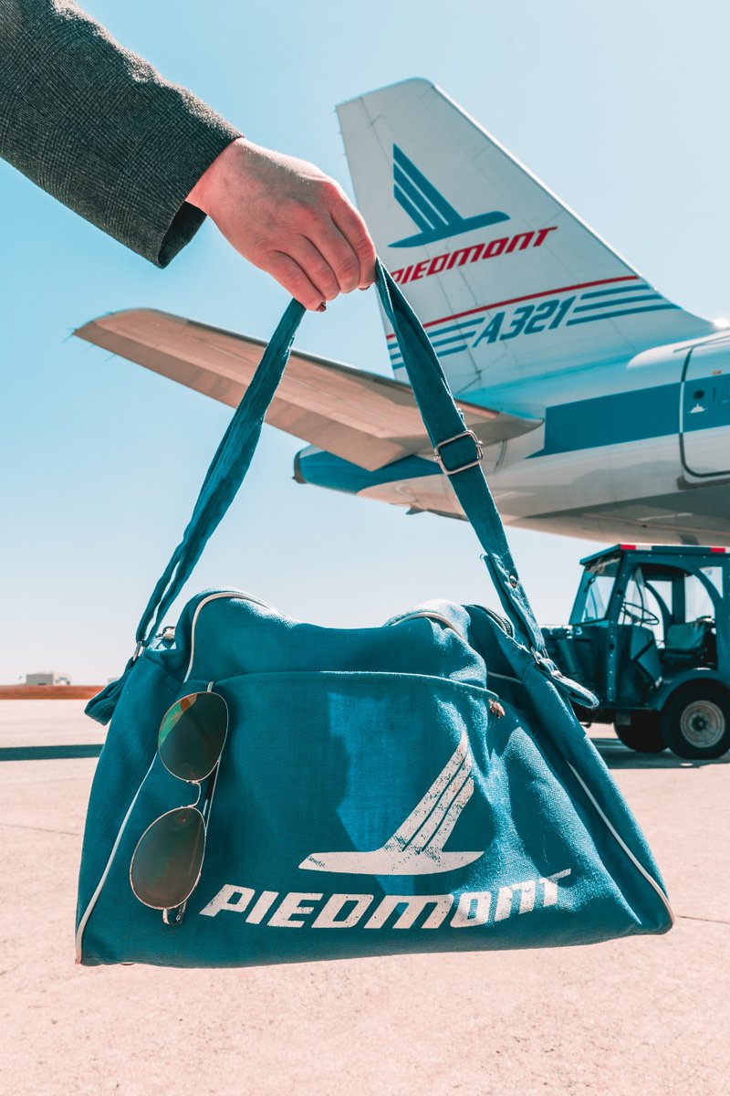 We love seeing <a href="/AmericanAir/">americanair</a>'s Heritage Liveries at #CLTairport! ✈️💕 So much so, we are giving away this @PiedmontAir bag packed with CLT swag! Tag your travel bestie in the comments to enter. The winner will be chosen at noon Friday, April 26. T&amp;Cs apply: bit.ly/3G2sDFg