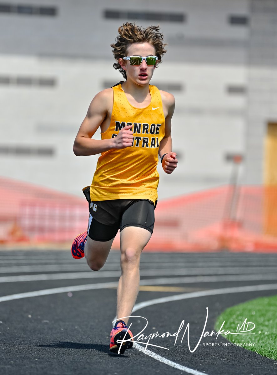 Monroe Central Distance Runner Freshman Zadok Lloyd rounds turn two in the 1600 meter run during the Muncie Central Relays