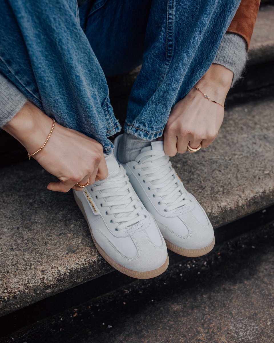 white CRACK sneakers with golden details. 

#kennelundschmenger #wecare #sustainable #new #whitesneakers #details #springsummer #summersneakers