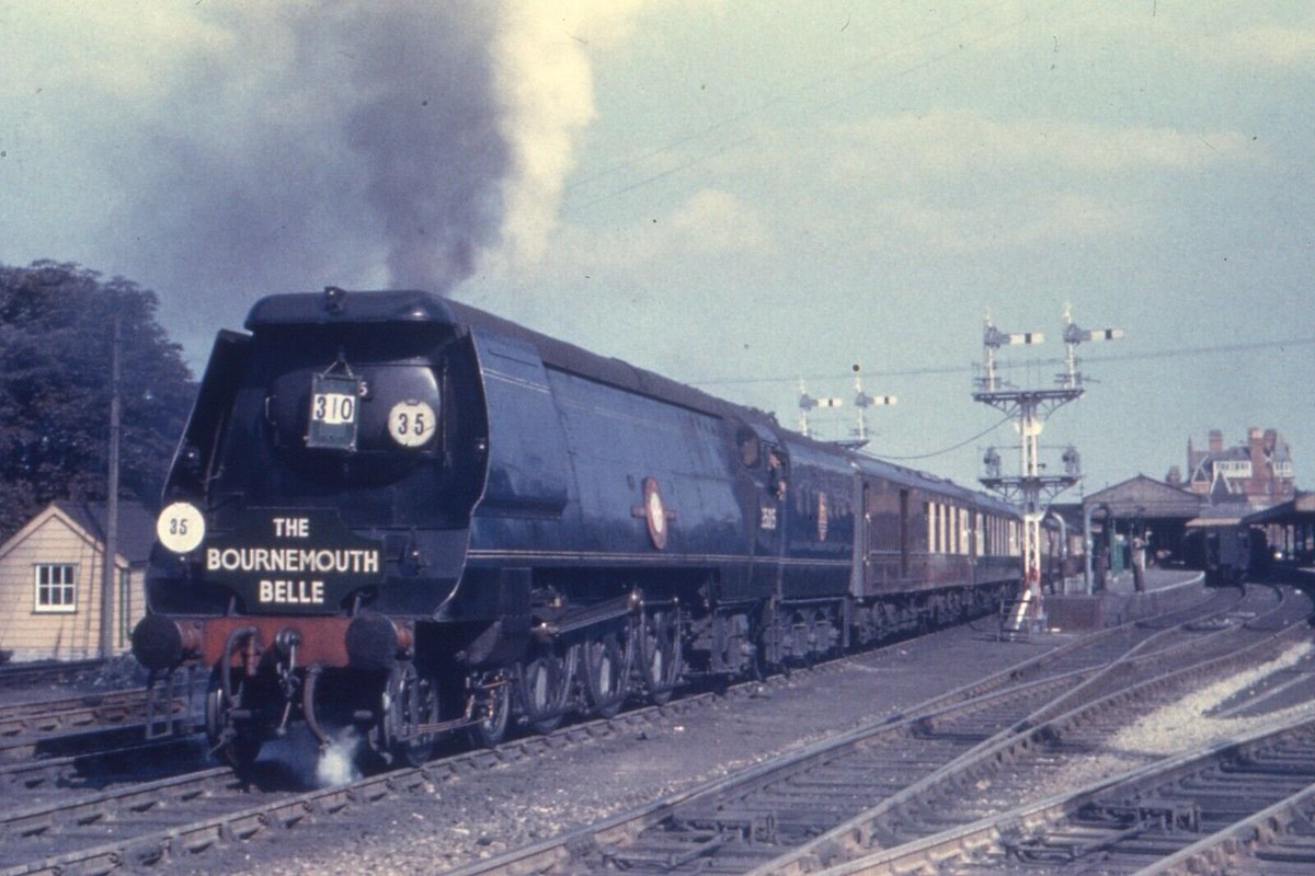 With the return leg of the Bournemouth Belle, Merchant Navy 35015 Rotterdam Lloyd sets out from Bournemouth West on 23rd August 1952 bound for London Waterloo. Rebuilt in June 1958 by Ron Jarvis, Rotterdam Lloyd would be withdrawn from 70A Nine Elms Shed on 23rd February 1964.