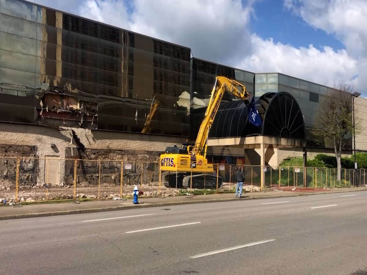 Some of the exterior features of the former Macy's location at the Charleston Town Center Mall are coming down ahead of the big tear-down Thursday. trib.al/jKDA4C2