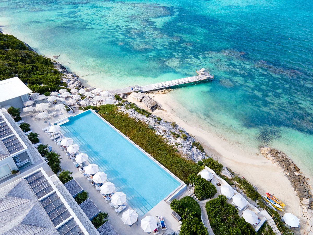 Check out the luxury resort & private residences in the heart of Turks & Caicos. 🔥 Only a three and a half hour flight from New York, but when you arrive to Rock House, you’ll feel like you’re in another world. Visit @rockhouseresort and explore more.
