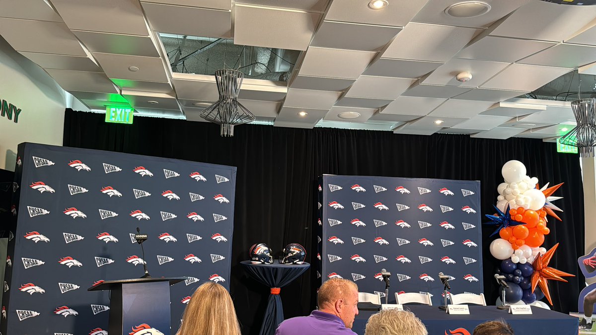 Getting ready for girls flag football press conference at the Broncos facility