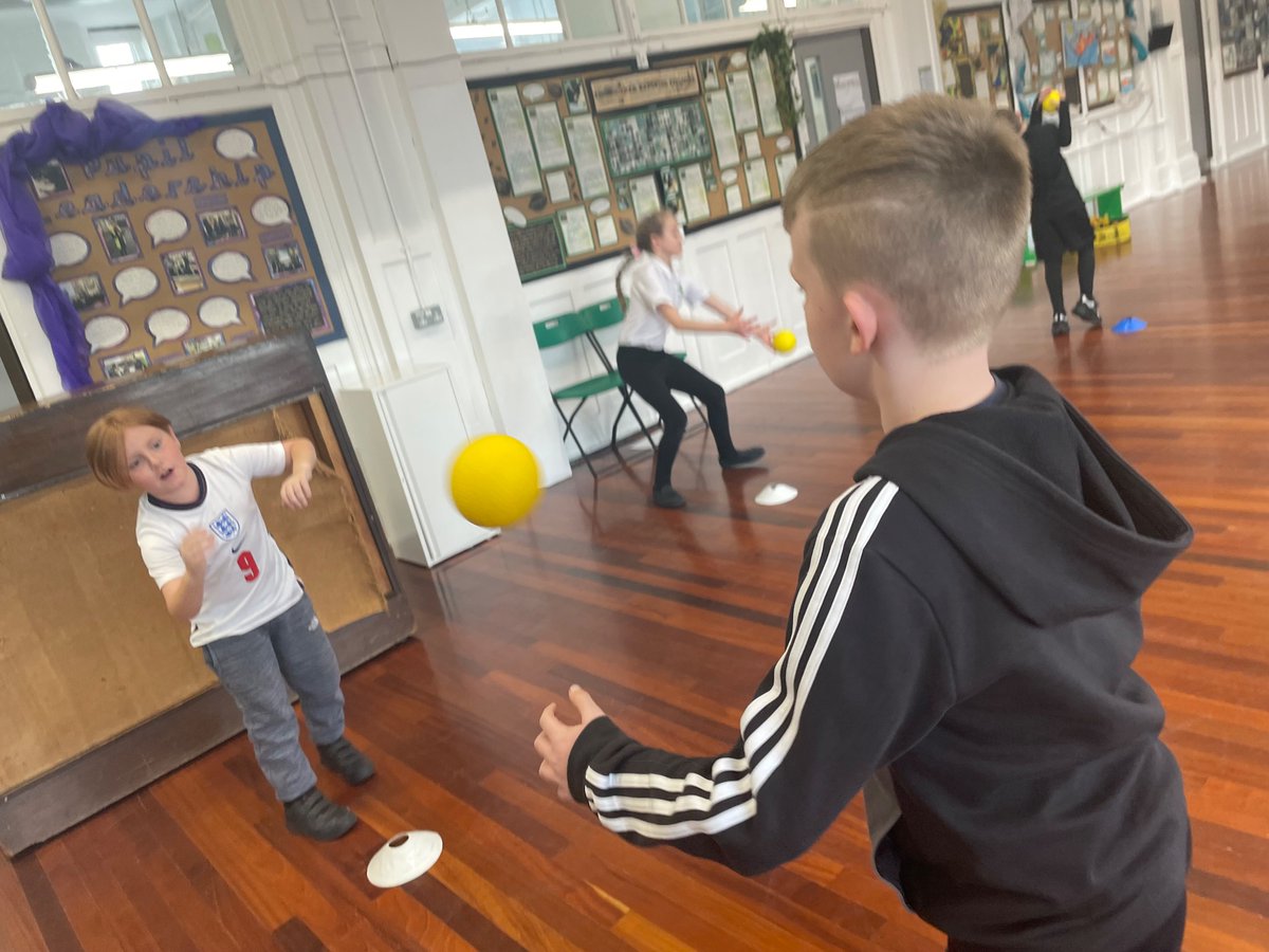 Practicing our over arm and under arm throwing today in PE! <a href="/WoodhillSch/">Woodhill Primary School</a>