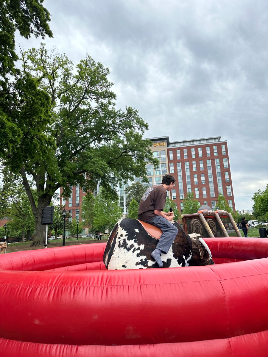 A mechanical bull in the middle of Monroe Park? That's right, it's the first annual @VCU Giving Day Games, available until 2pm! Play and win $5 towards your chosen area of impact. #VCU #VCUGivingDay