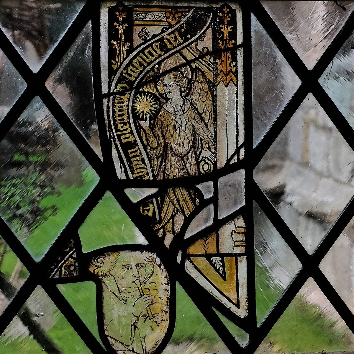 Cartmel Priory #Cumbria visited in 2021. Beautiful reset fragments of medieval stained glass in the porch. #StainedGlassSunday