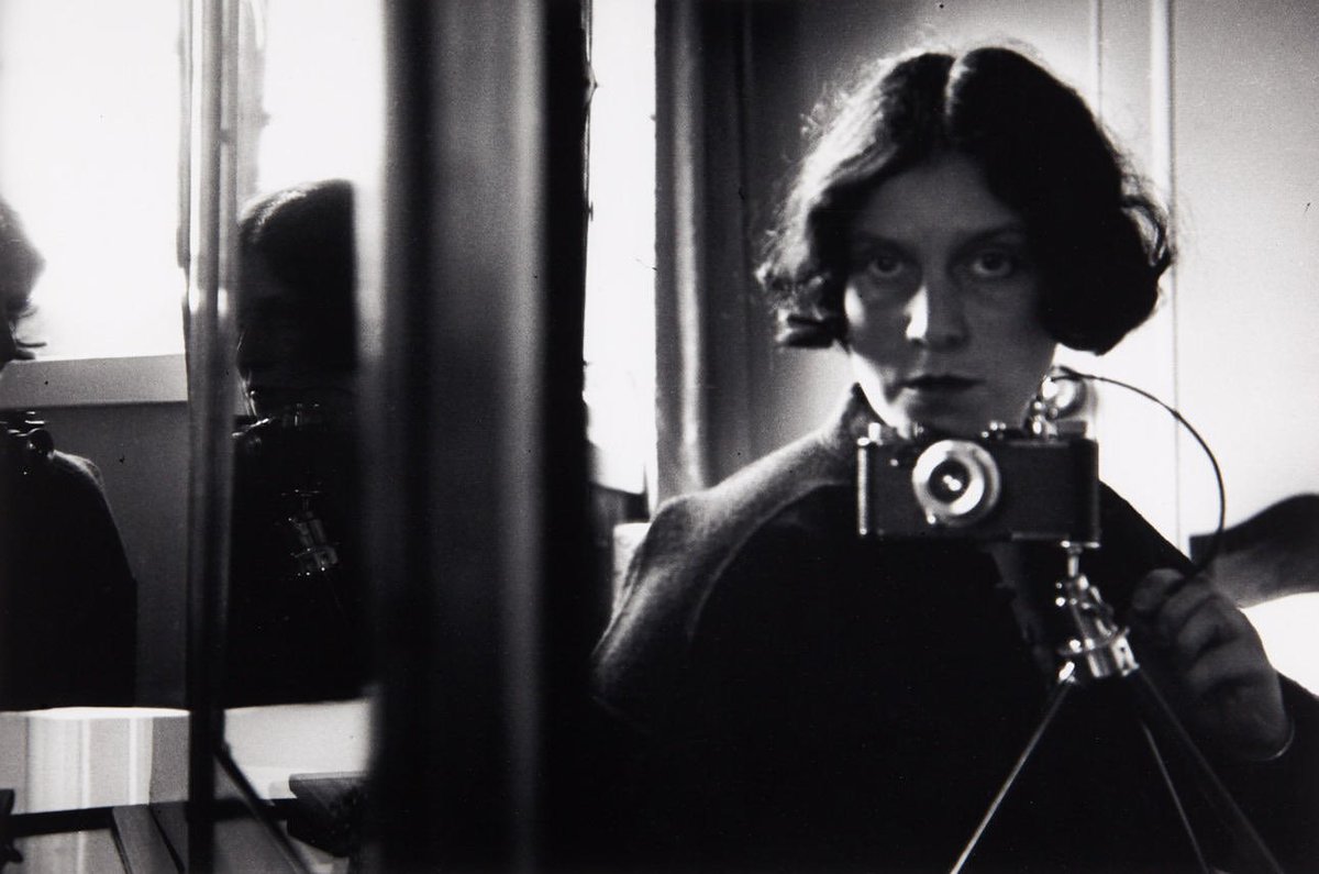 Ilse Bing. Self-Portrait with Leica. Paris. 1931.