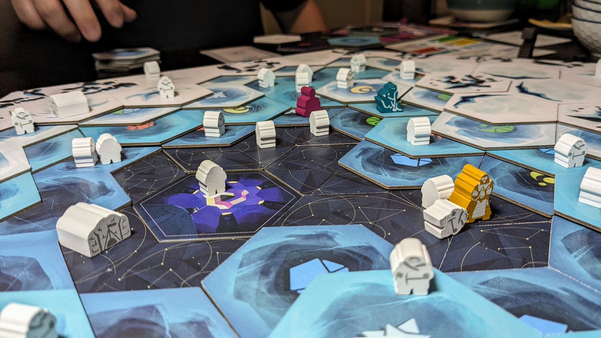 ICE is absolutely mesmerizing to look at, especially for fans of tessellated tile layouts. It sports some fascinating semi-cooperative dynamics too, everyone sharing the same archaeologist meeples to help dig through the ice.