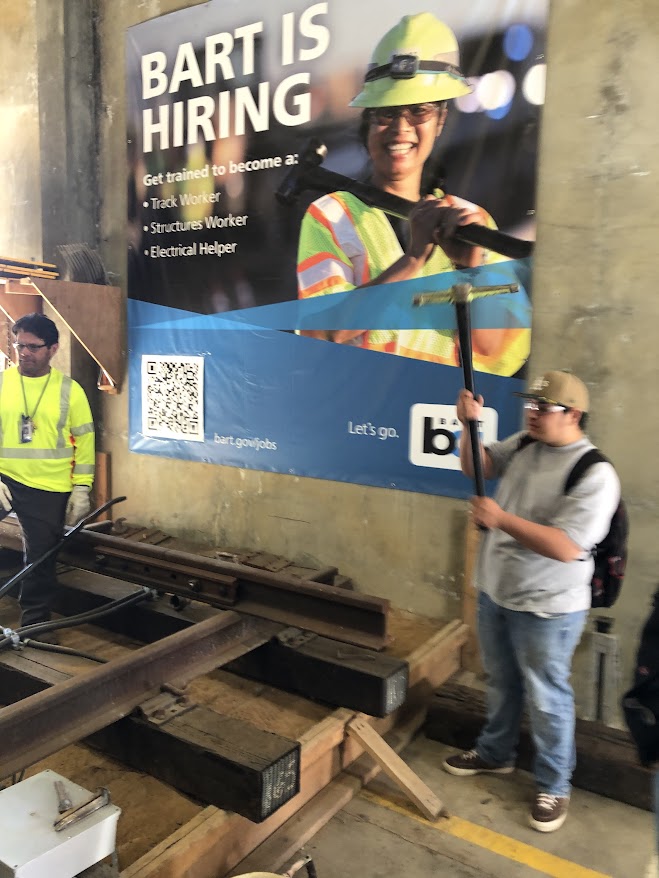 At last week's biannual @OUSDNews Skilled Trades Fair, 100s of HS students experimented with heavy construction equipment, learned about careers in public agencies and local companies, & some of them also asked young people from other high schools for their phone numbers LOL. 1/3