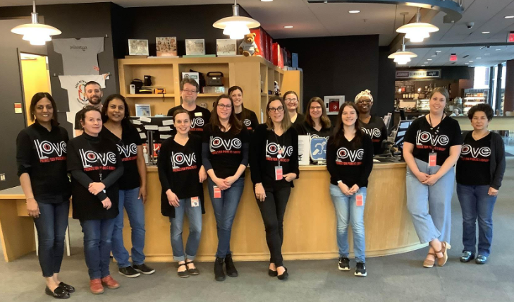 PrincetonPL's tweet photo. It was 20 years ago that the doors to the newly built Princeton Public Library opened. Some of our staff gathered to commemorate the occasion by modeling new staff t-shirts. A full slate of celebratory events happening from now to 9 pm.  
Details here: https://t.co/yKrmCi4cXx https://t.co/XaRQXY3ABw