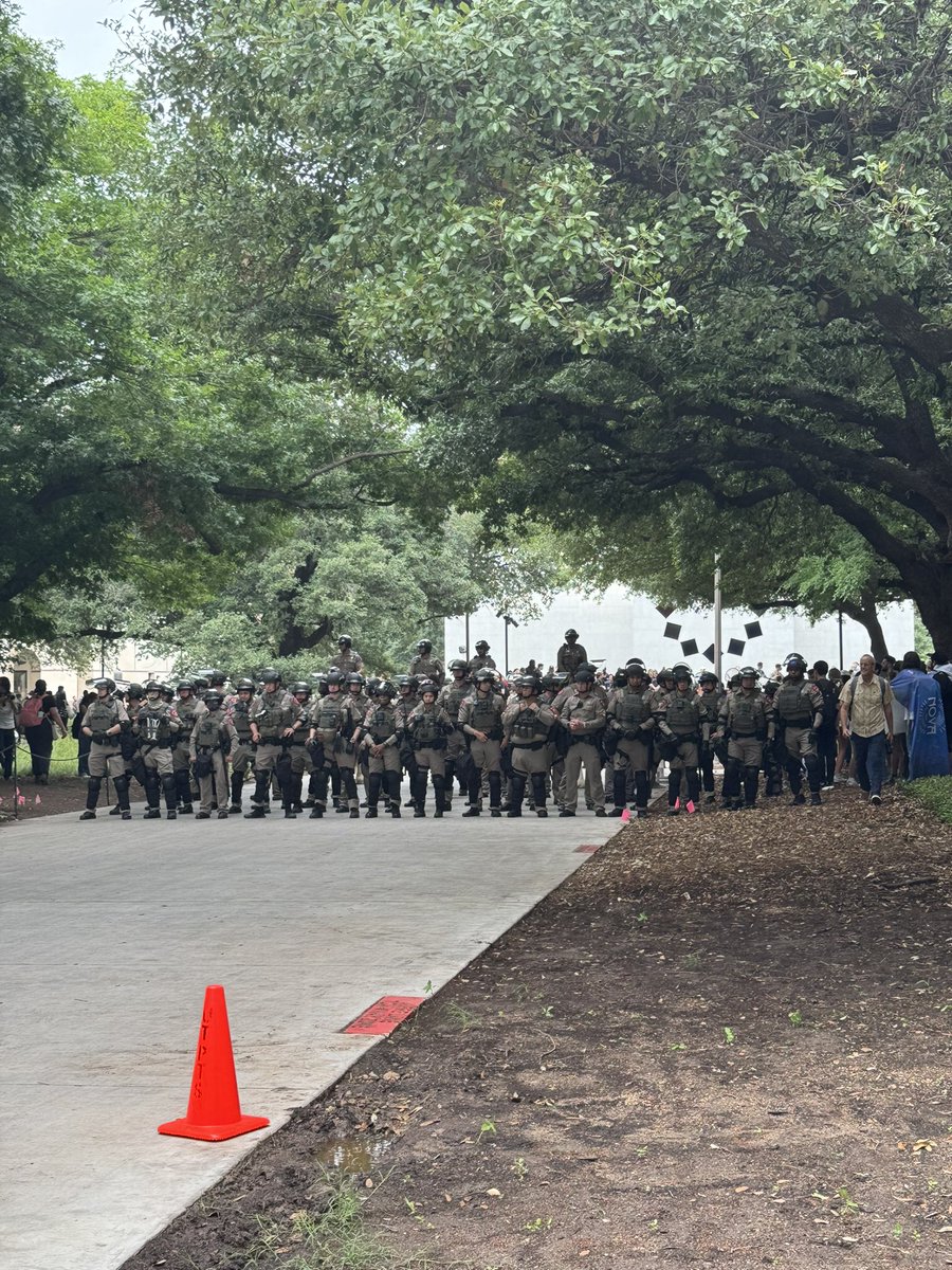 Looked like 100+ state troopers, UT police, and APD for a pro-palestine protest on UT Austin campus today. This is absolutely absurd.  Standing right behind the police were UT staff (think Dean of Students staff?)