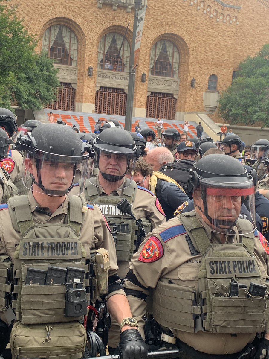 state troopers are now shoving protesters who have no where to go since they’re hemmed in on all sides, one arrest so far, he has roughly *20* state troopers detaining him. he was simply walking in the demo