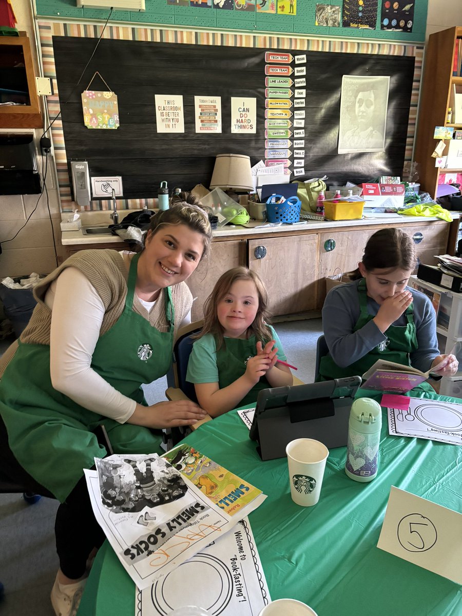 HealeyHeather's tweet photo. When students ask why they can’t have Starbucks at school, Ms.Murphy agreed to give them the whole experience! Book Tasting and Baristas! Thanks for the aprons and cups, @StarbucksCanada @alcdsb_olmc https://t.co/5QHQMdyTDT