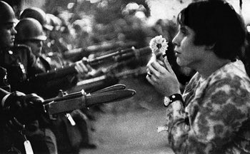 One of the famous historical photos of dangerous student radicals kept from causing untold harm by the sensible and reassuring deployment of armed force, during protests over a war that was good and which succeeded and of which everyone now is proud.