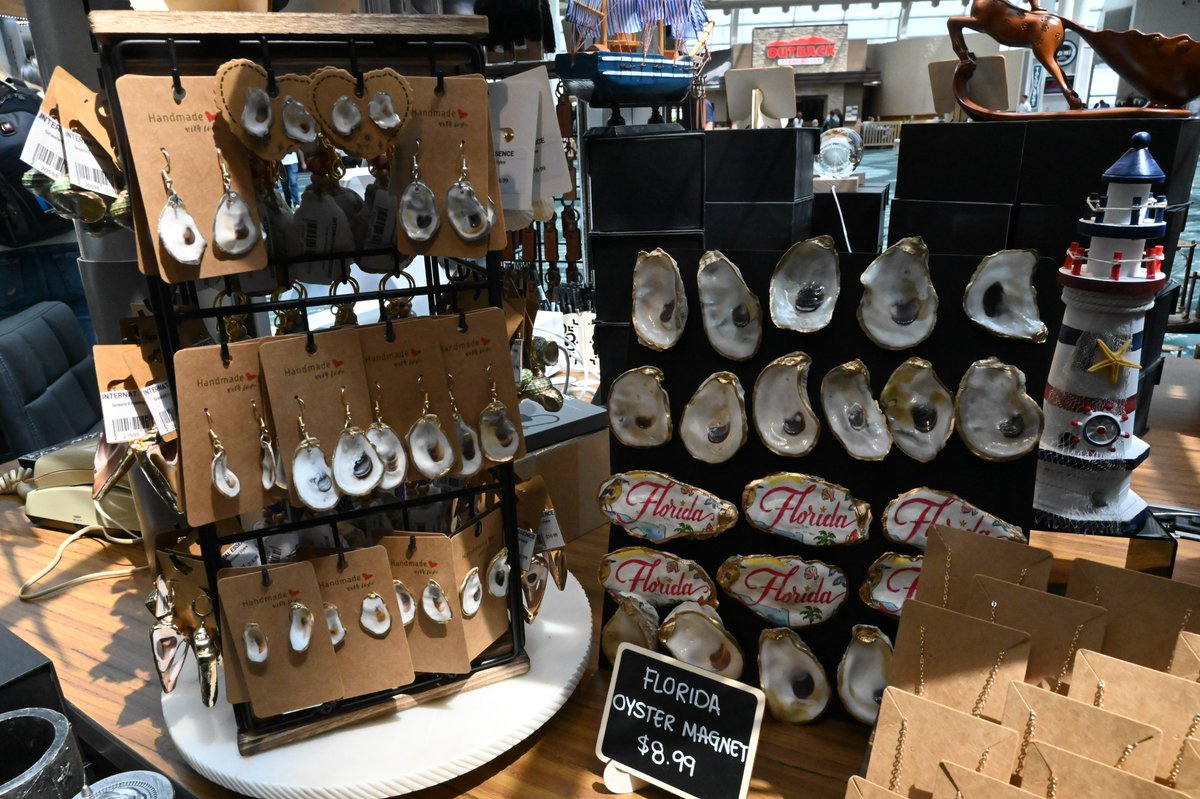 Looking to take a piece of the Sunshine State with you? Stop by International Essence! From unique jewelry to keychains, they have unique items that are sure to bring joy and remind you of your adventures in Florida! 🛍️ 📍 Gates 70-99