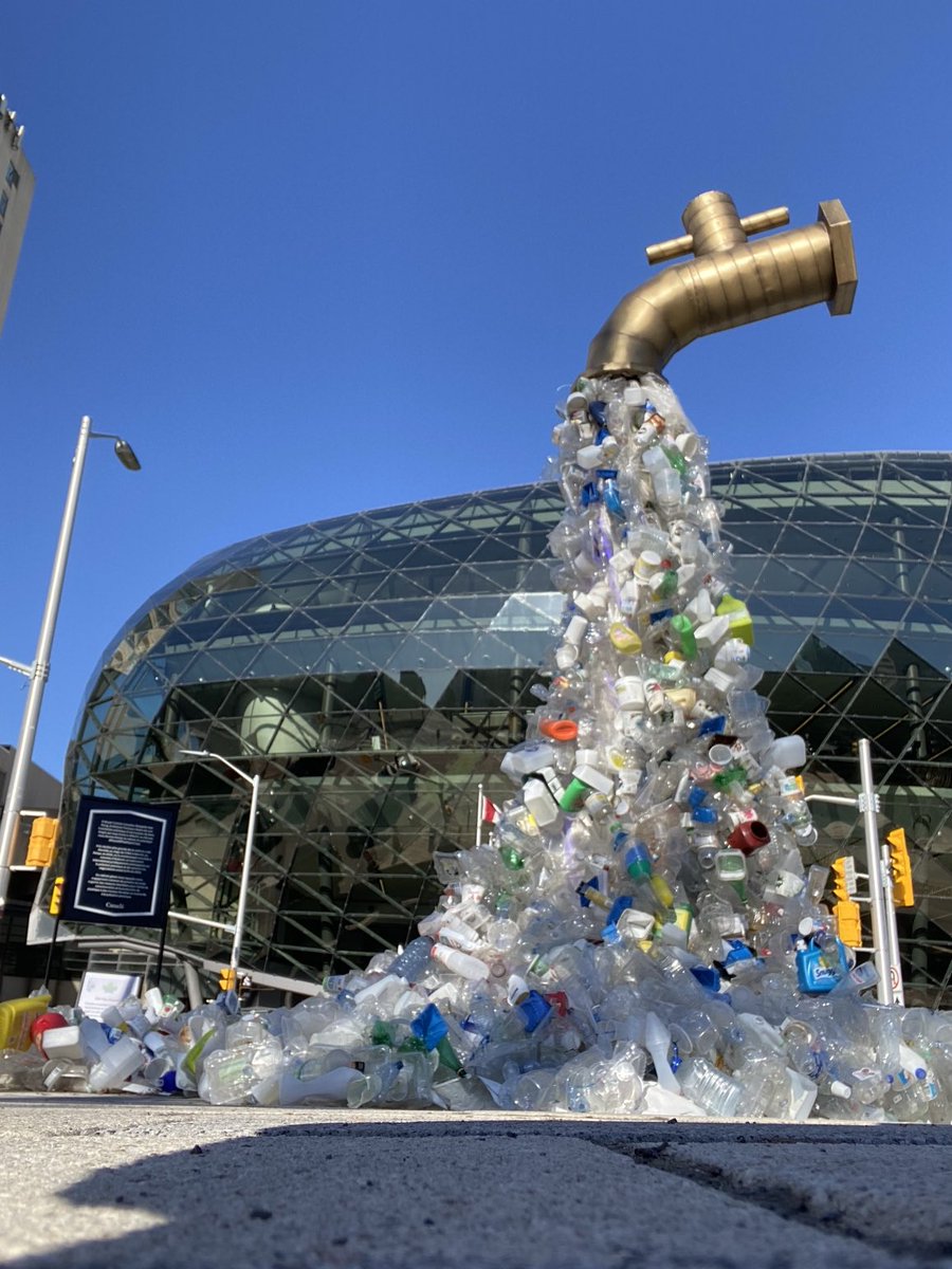 The Giant Plastic Tap by sculptor Benjamin Von Wong is on display outside the Shaw Centre for the duration of the UN negotiations on plastic pollution in Ottawa.