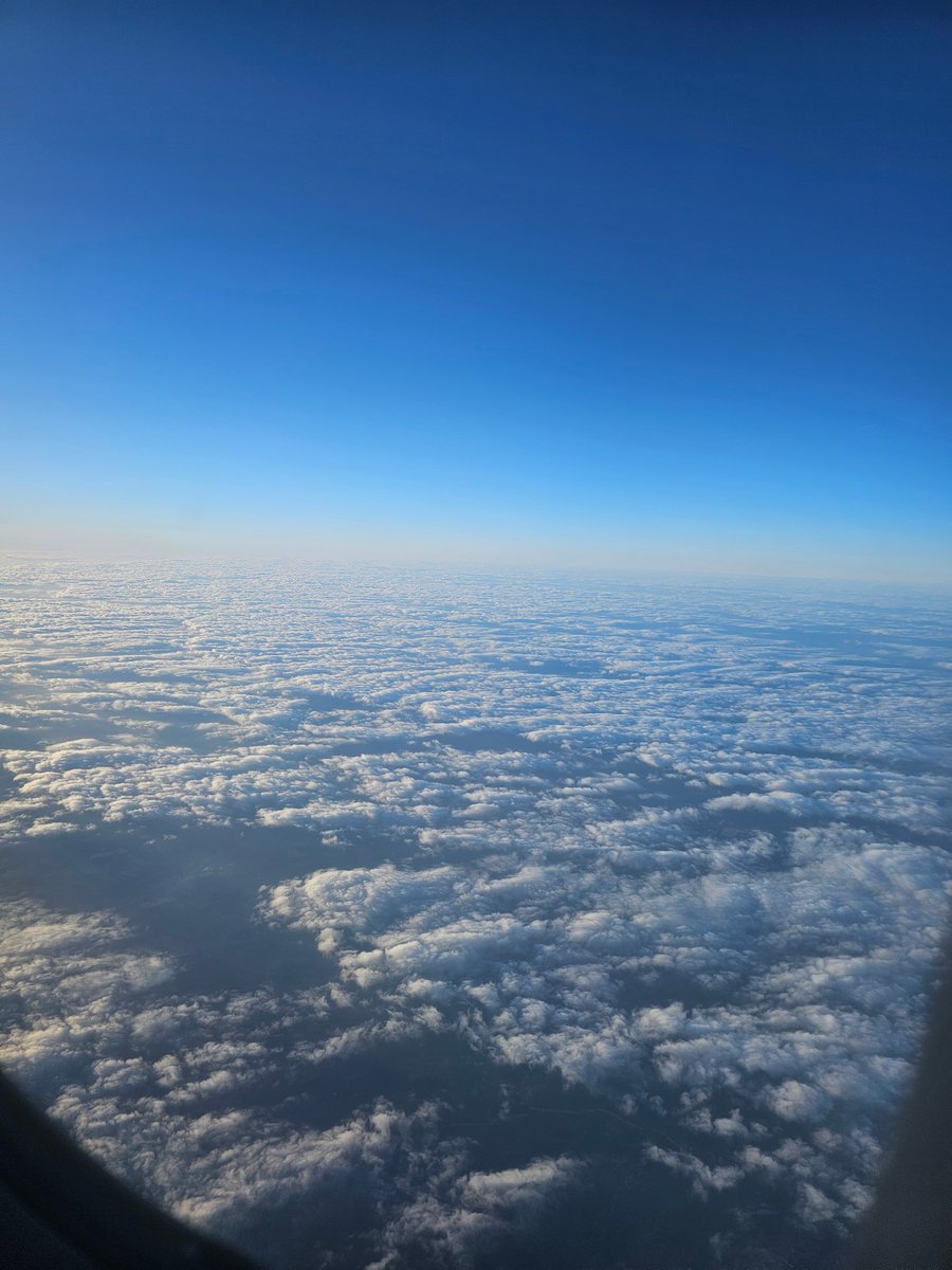 I book the window seat whenever I can. I like it most when we float above a floor of clouds, with no line on the horizon - it feels to me like a future with infinite possibilities. I heard once that looking at nature, up into trees, across the sea or sky - for even a short