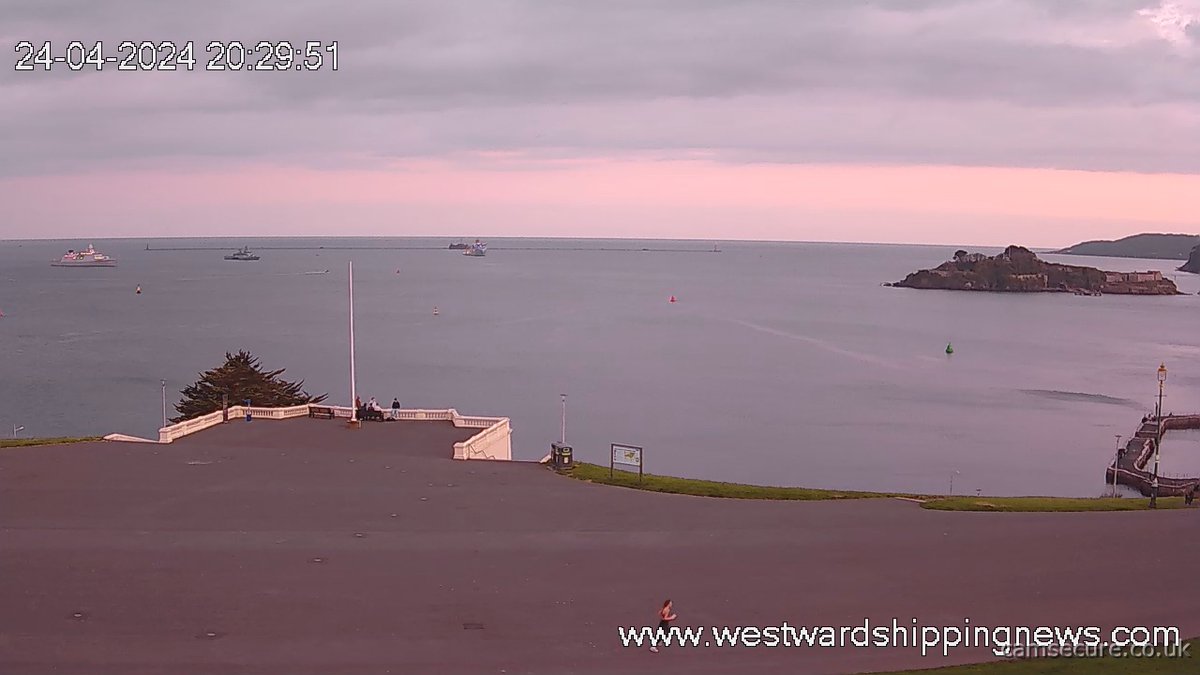 Pink is the colour and three ships at anchor in the Sound including Dutch frigate HNLMS De Ruyter, German corvette the FGS Ludwigshafen am Rhein, and the UK's RFA Proteus. Live image from our webcam: westwardshippingnews.com contact@westwardshippingnews.com