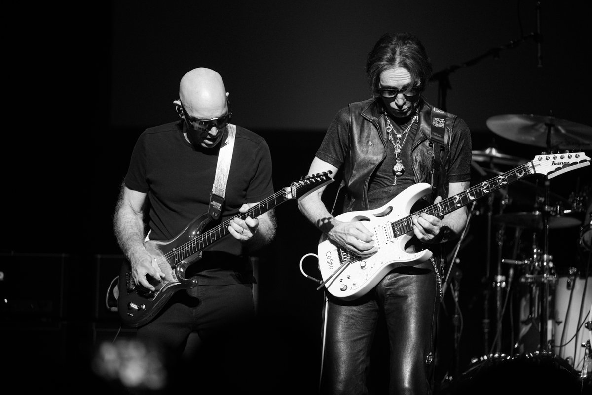 Just two old friends and their guitars - backed by an electrifying band, of course!  🤘🎸🎸 The #SatchVai tour dropped another exhilarating show last night in Milwaukee! Next stop, Minneapolis 🔥

📸 : Brianna Griepentrog