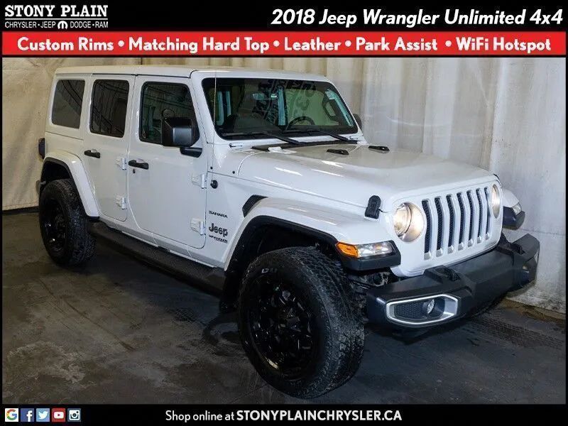 💵DEAL OF THE DAY💵 - Check out this 2018 #Jeep #Wrangler Unlimited Sahara complete with custom rims, matching hard top, leather seats, park assist, Wi-Fi hotspot, and more! Get more details at buff.ly/44ipDSC, call 587-760-1594, or stop by today!
#StonyPlain #SpruceGrove