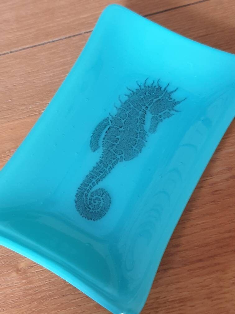 Beautiful turquoise blue soap dish with a sweet raised glass seahorse design. Lovely handcrafted little rectangular dish. #handmade #etsy #giftideas #homedecor #shopindie