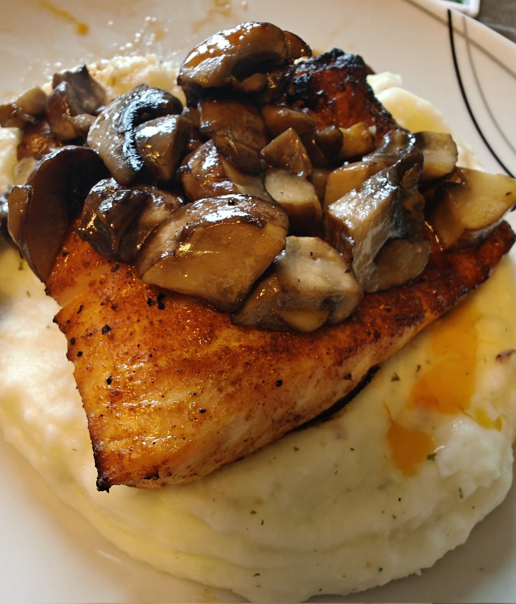 Salmon with sauteed mushrooms over a bed of mash. Not bad if I do say so myself