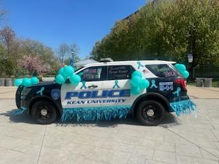 kupolice's tweet photo. Today members of the KUPD in collaboration with Union County Department of Human Services-Division of Individual &amp; Family Support services hosted a "Dec the Cruiser" event in support of Week of Action to raise Sexual Assault Awareness. https://t.co/aytFiFVL6n