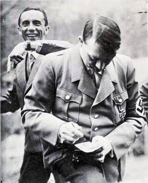 Goebbels photobombs Hitler (Follow my YouTube in my bio)