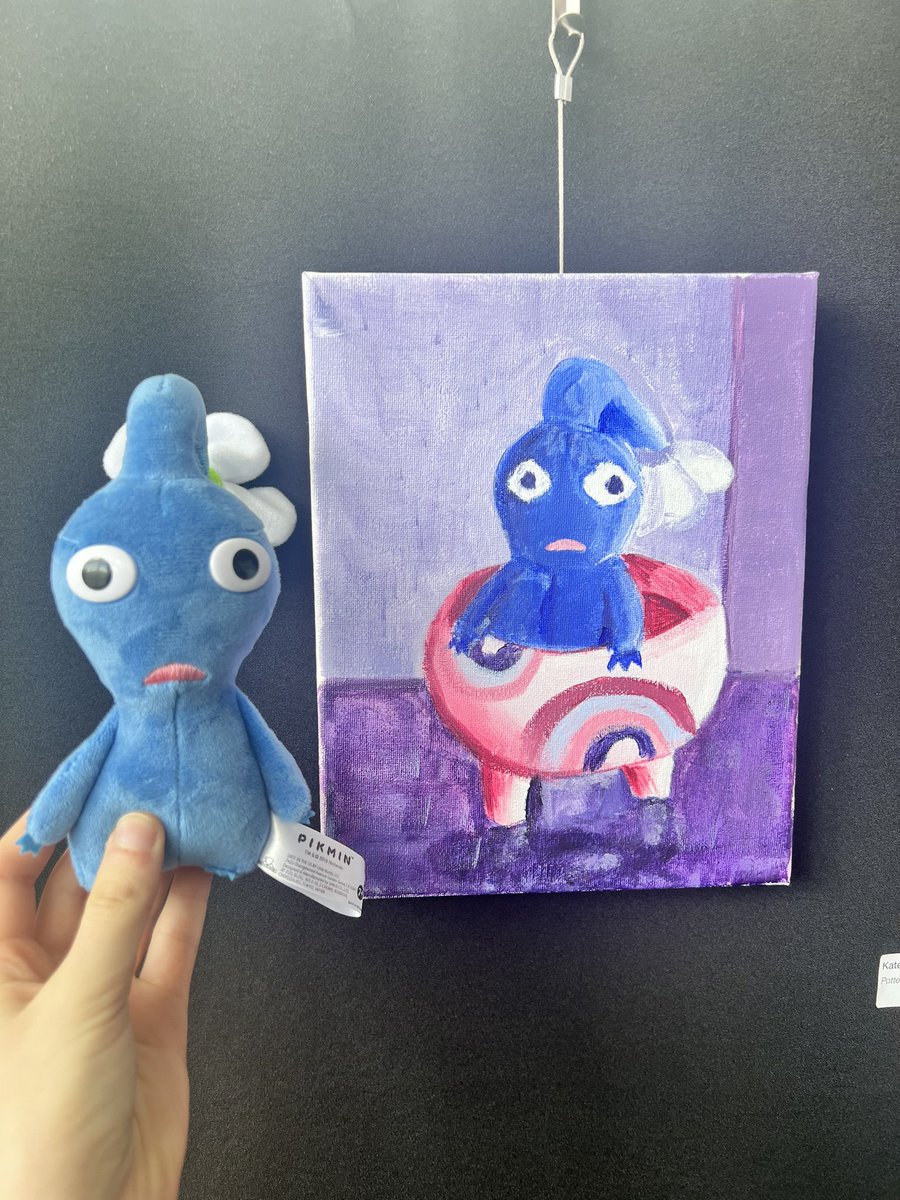 [#pikmin, #pikmin4] I’ll post more pics later but my paintings got featured in my college’s celebration of arts! Here’s the man of the hour (this is the first thing people see when they walk in LMAOO)