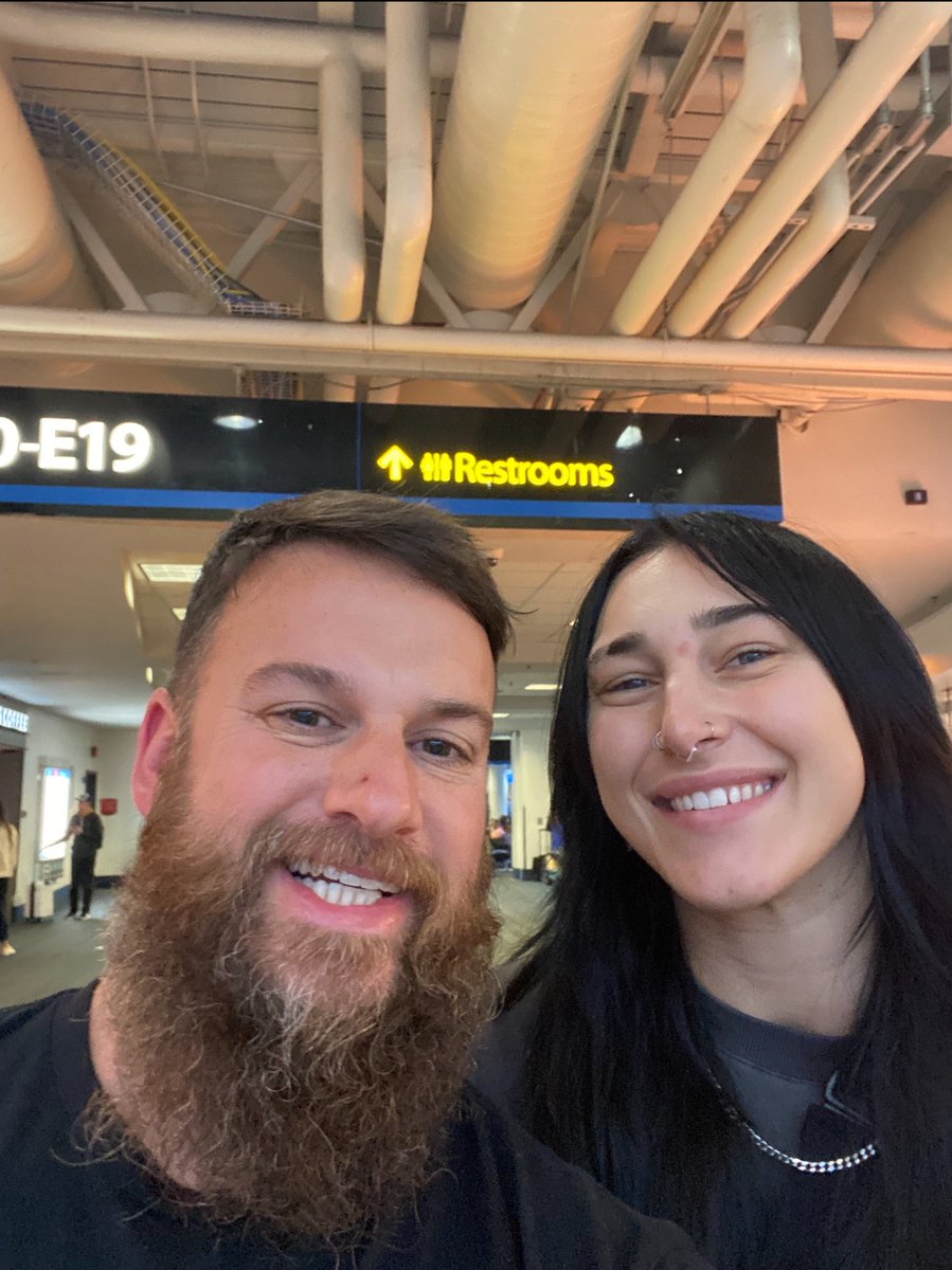 One of my colleagues just bumped into @RheaRipley_WWE at the airport, damn!