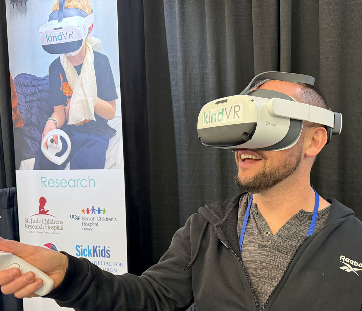 kindVR's tweet photo. We're at #SPA2024 discussing VR support during pediatric procedures. The room is full of talented pediatric anesthesiologists who care deeply about their patients.   #VR #Childlife #CCLS https://t.co/LrpfqanJB6