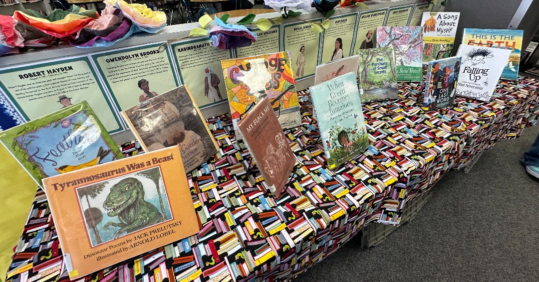 TCKStockton's tweet photo. We are celebrating National Poetry Month throughout April! Students can check out a variety of thoughtful and creative poetry books in our library, and we are looking forward to a visit from Poet Laureate Jazmarie LaTour on Thursday, April 25.

#NationalPoetryMonth #Literacy https://t.co/hIcoupKc0X