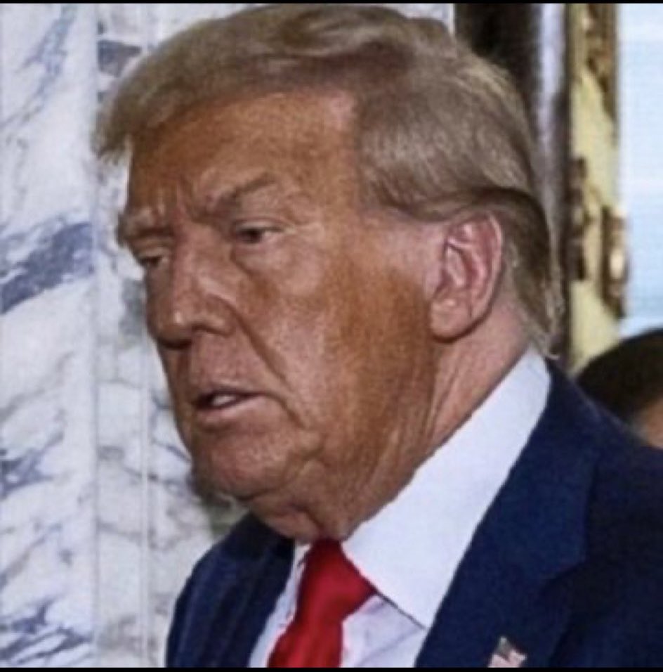 Ol’ Mudface really needs to find a makeup artist who doesn’t hate him.