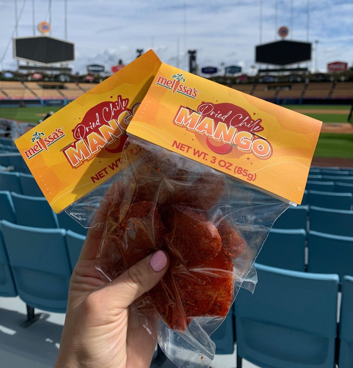 Dried Chile Mango on deck at Dodger Stadium! 🏟️😎 The @dodgers host the @padres this weekend ⚾️ who's coming to a game!? #MelissasProduce #StadiumFood #HealthyOptions #Dodgers #Padres