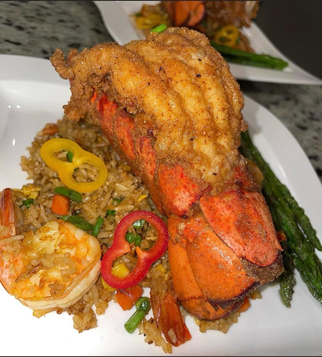 Shrimp Fried Rice served a with Lobster Tail! 

Would you eat this for Friday Supper? 👊🏽💥