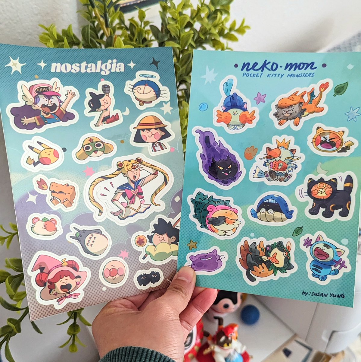 I was hoping to have these sticker sheets come in time for Sakura-con, but alas I got them a tad a little late! The nostalgia ones have a slight chromatic aberration to them, it might be hard to see in the picture XD