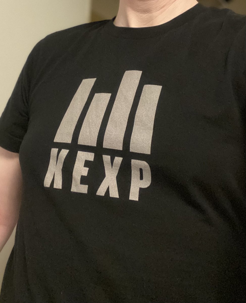 @ThatEricAlper We have band t-shirt Fridays at the office every week here. Didn't wear a proper band t-shirt this week, but a KEXP one since they're brilliant and I can't imagine a world without them. I think that counts, right? @kexp