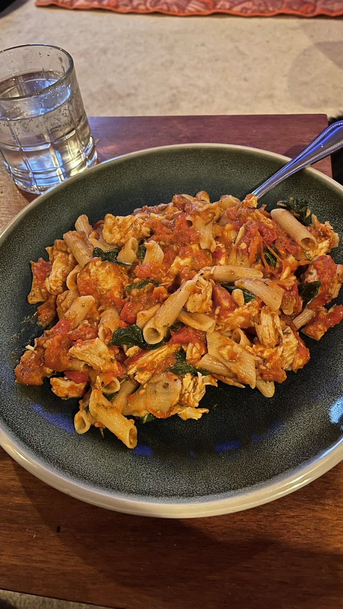 Chicken and penne pasta with homemade tomato sauce. 😋