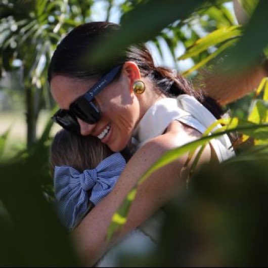 This picture of Meghan Markle through a bush is of better quality than anything we have seen of Kate Middleton since Christmas.