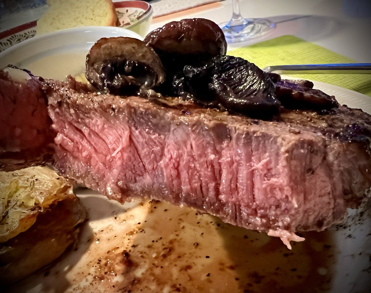 #TwitterSupperClub #FridayNightFeast! Grilled NY Steak w/Sautéed Baby Bella Mushrooms Roasted “Smashed” Baby Dutch Yellow Potatoes w/Chopped Chives Whole Kernel Corn Caesar Salad w/Garlic Toast Pinot Noir #Wine