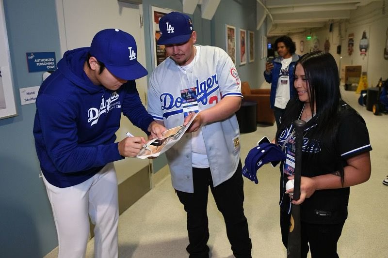 MattSeedorff's tweet photo. UPDATE: Ambar Roman got to meet Shohei Ohtani before tonight’s @Dodgers game.  Last week, she caught Ohtani’s first home run baseball as a Dodger.  Ambar and her husband were gifted club dugout seats for Friday’s game.  It just so happens, it’s Ambar’s birthday! #MLB https://t.co/zREZVIG918