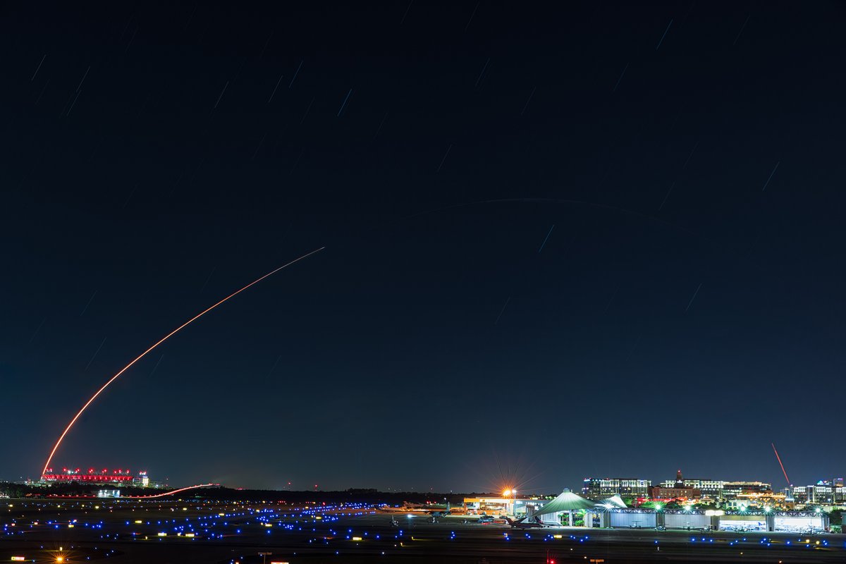 SpaceX launch tonight as seen from @flytpa over @rjstadium. This was a record setting 20th flight for this booster which you can see returning on the right side of the frame.