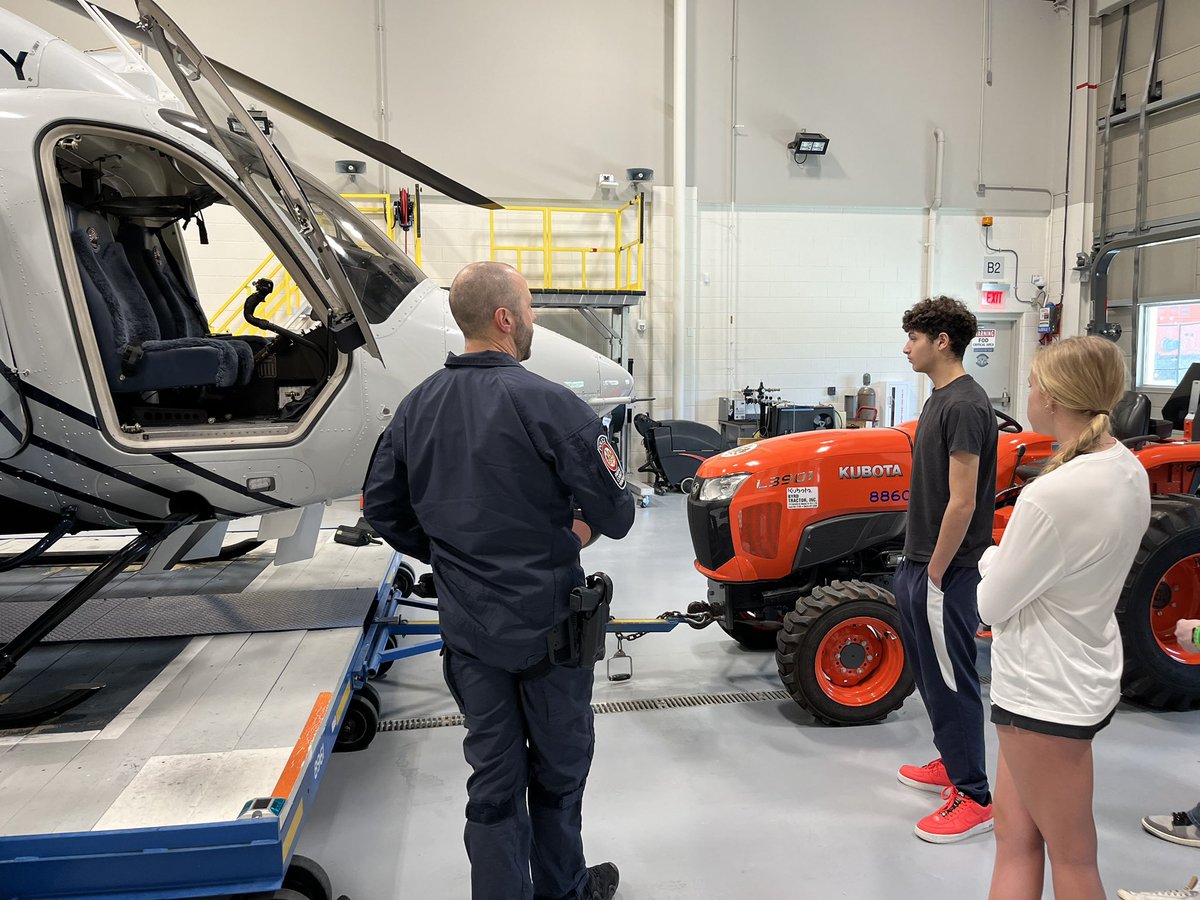 CVHS_AutoTech's tweet photo. CVHS Auto Tech students participated in a great field trip to the @FairfaxCountyPD helicopter unit today, where they got to talk to the pilot and the mechanic who works on the helicopters, as well as see how the legendary “Fairfax1” keeps us all safe in Fairfax County! @FCPS_CTE https://t.co/GDShy8gQ04