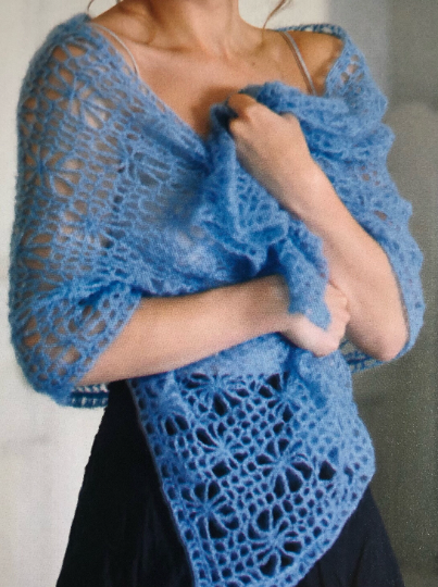 Crochet a stunning shawl 🩵 Ideal for a lovely summer's day, this lightweight and airy design adds a touch of elegance to any outfit. Perfect for layering or as a statement piece, it's a versatile addition to your wardrobe. #MHHSBD #craftbizparty #shopindie #UKGiftAM #crafturday