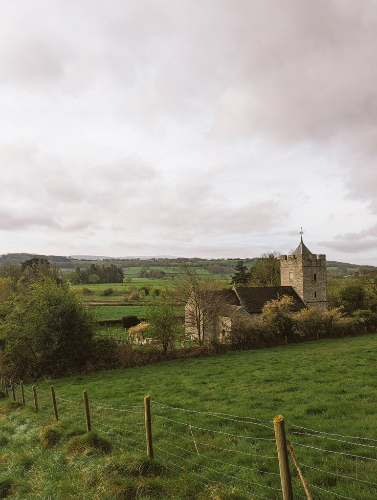 Morning dog walks are always better in the sun... 
We are so lucky to have such great walks near The Agents House. 
This is Whitney Village church with the black mountains as a back drop. 
#dogfriendly #dogwalks