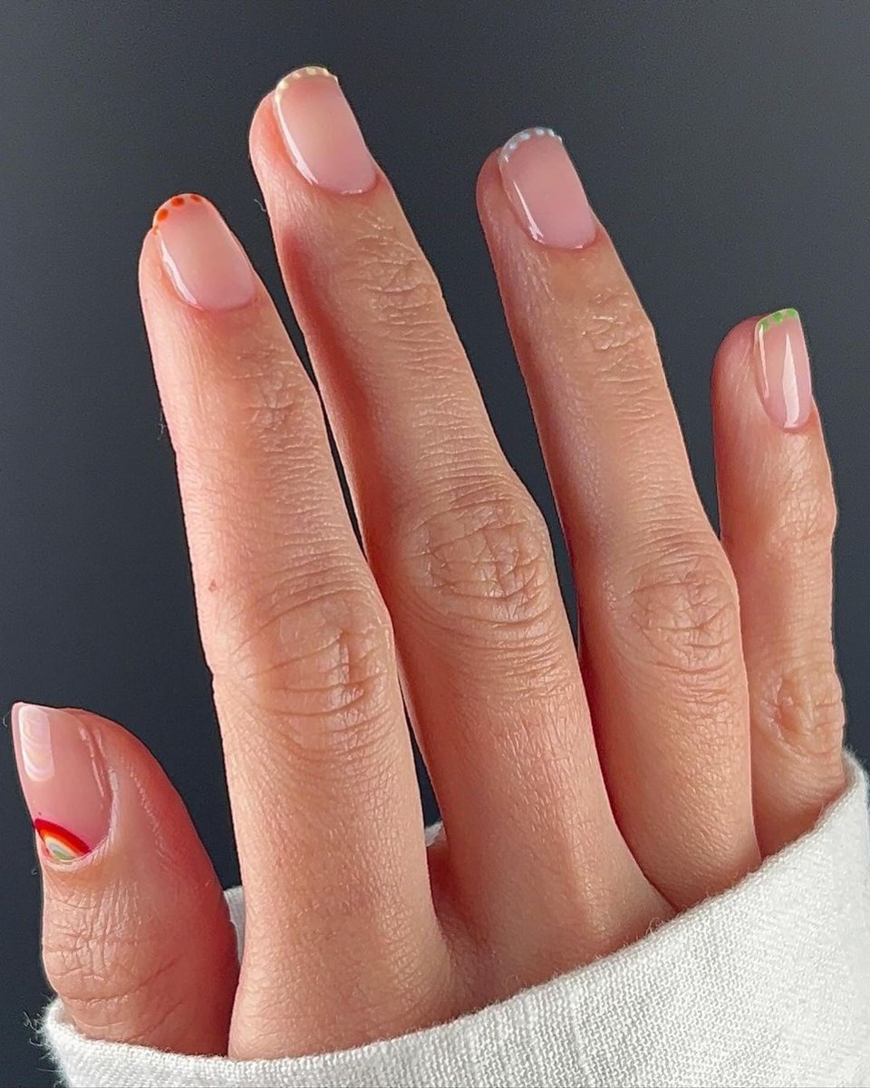 Love a sheer, chic manicure but want to spruce things up for spring? Add a pop of pastel, a colourful french tip or an entire fruit cocktail for a joy-inducing manicure. See more colour pop inspo at the link - trib.al/uGsVXEo?utm_so…