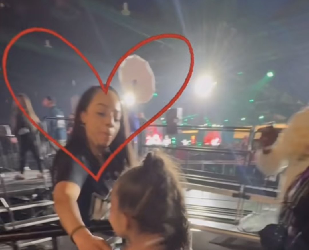 Nah idk who this lady is but she was making dreams come true all weekend!! One of the best workers they had there at WWE World! I wish I had gotten her name!