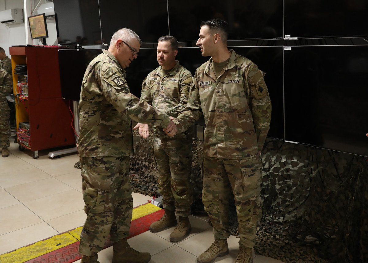 Service members assigned to 138th Field Artillery Brigade recently received coins in recognition of their hard work.