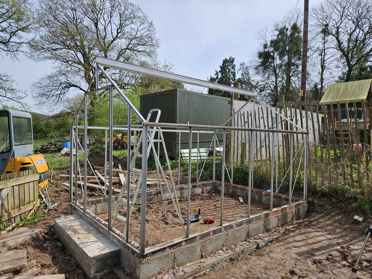 I had a bit of an erection yesterday! 
Not easy by yourself, but I managed to get some of the frame up to my 'new' greenhouse.
Look at the size of the aluminium on the ridge, such a good quality one.